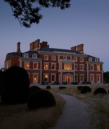Heckfield Place exterior at night